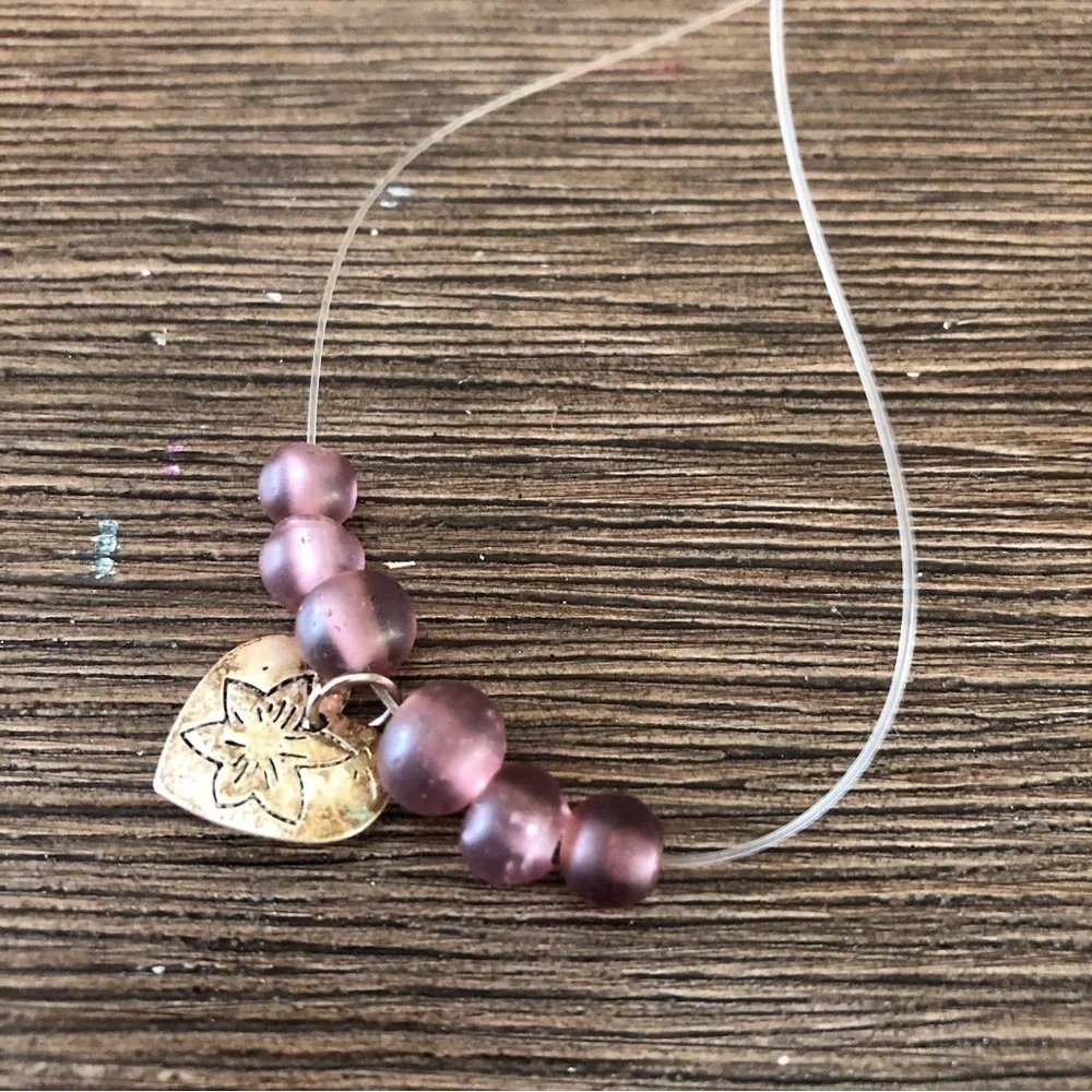 Handmade floating heart and purple beaded necklace